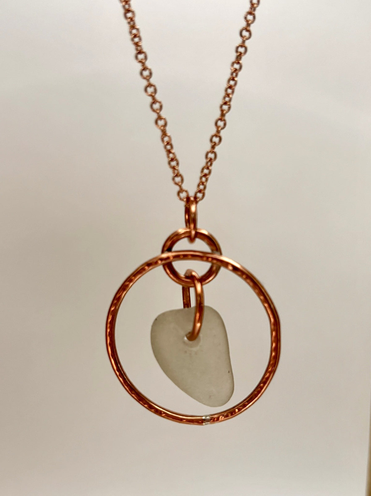 Hammered copper hoop and sea glass necklace