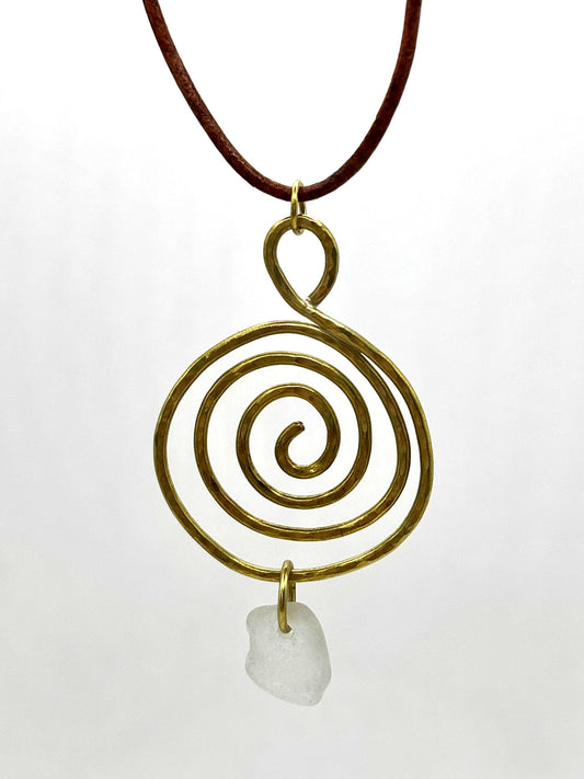 Brass whirlpool and sea glass pendant