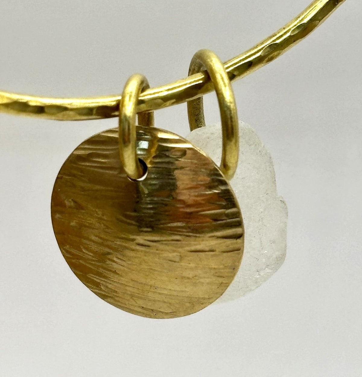 Hammered brass sea glass charm bangle