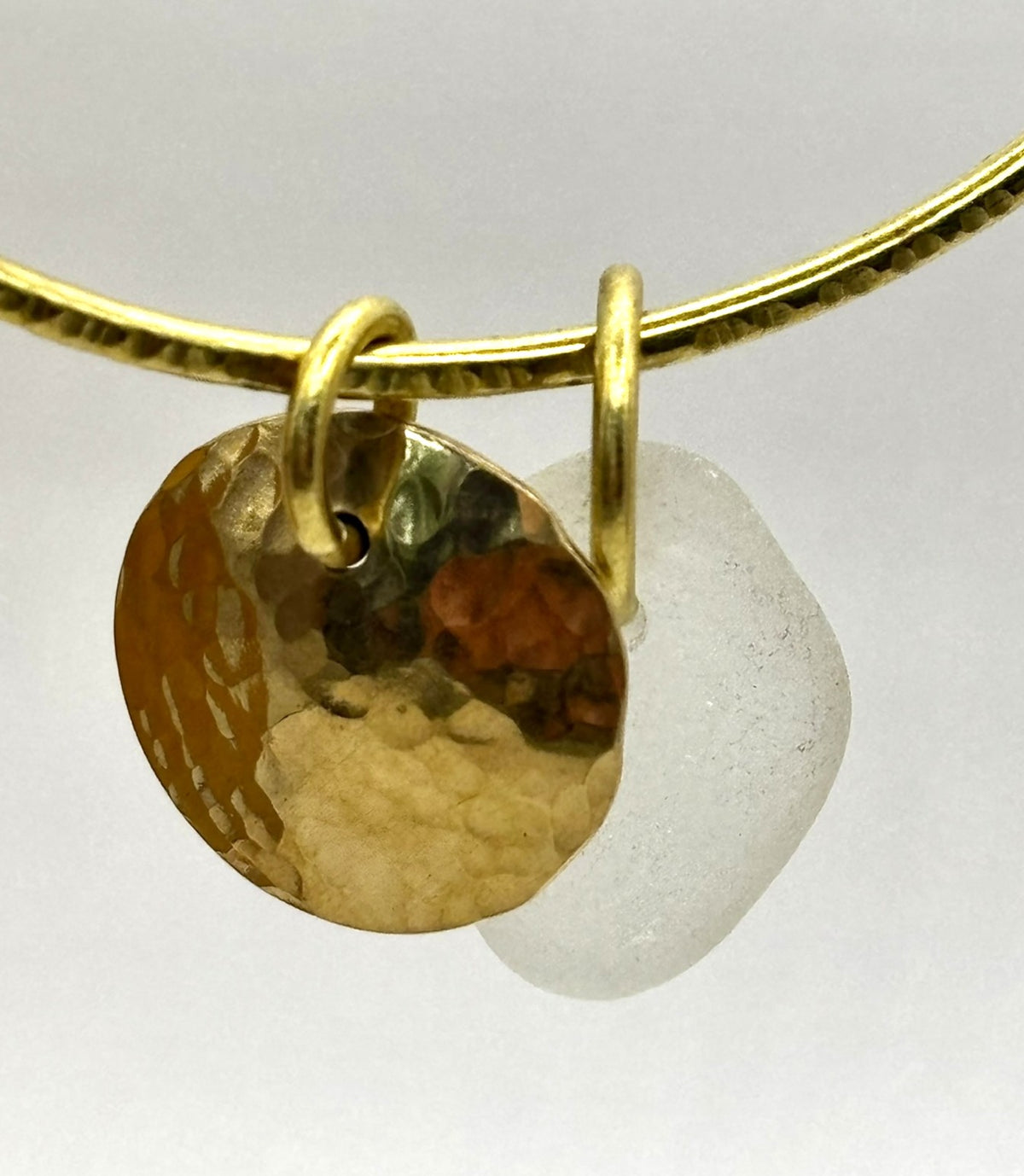 Hammered brass sea glass charm bangle