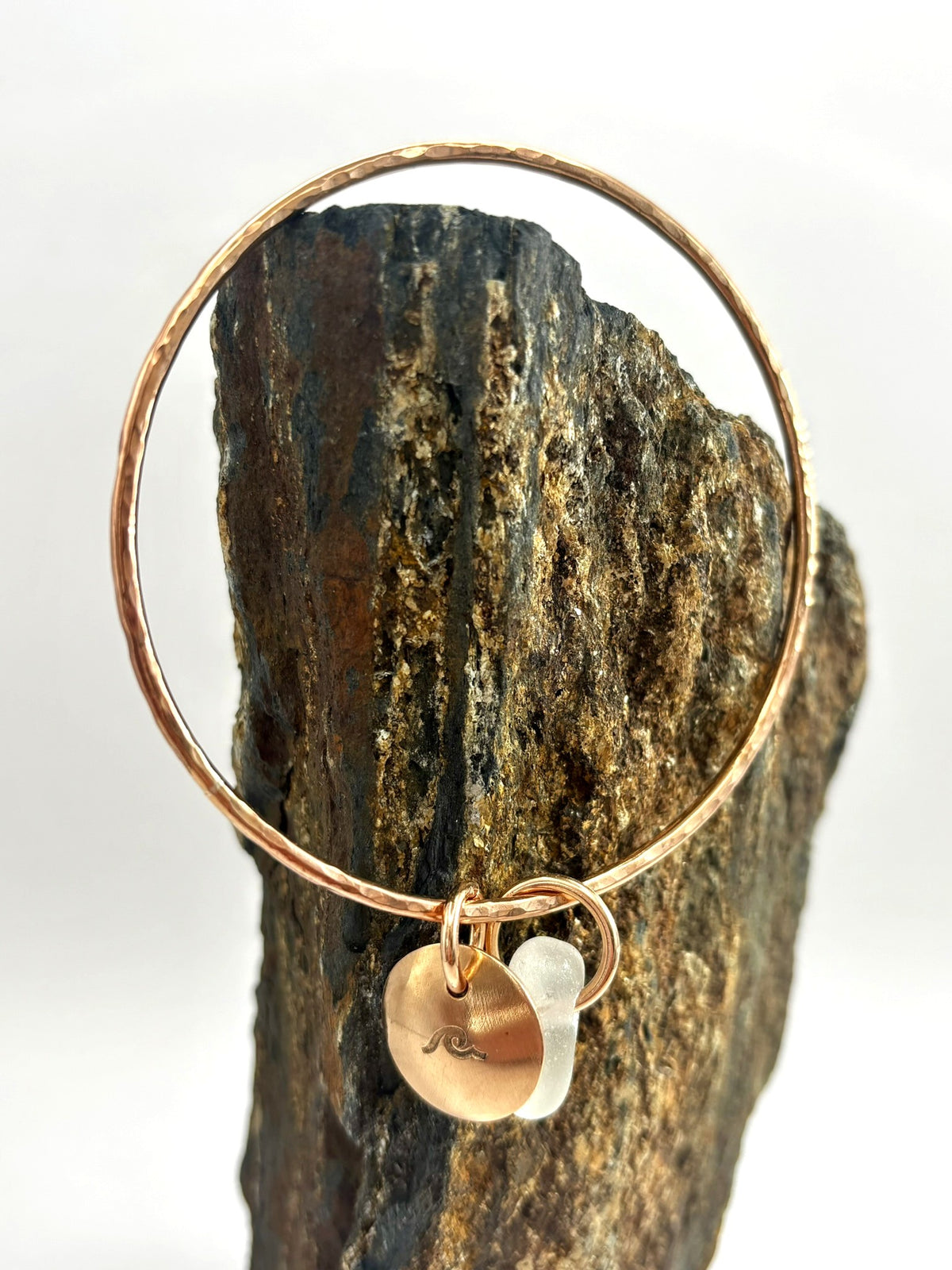 Hammered bronze sea glass charm bangle