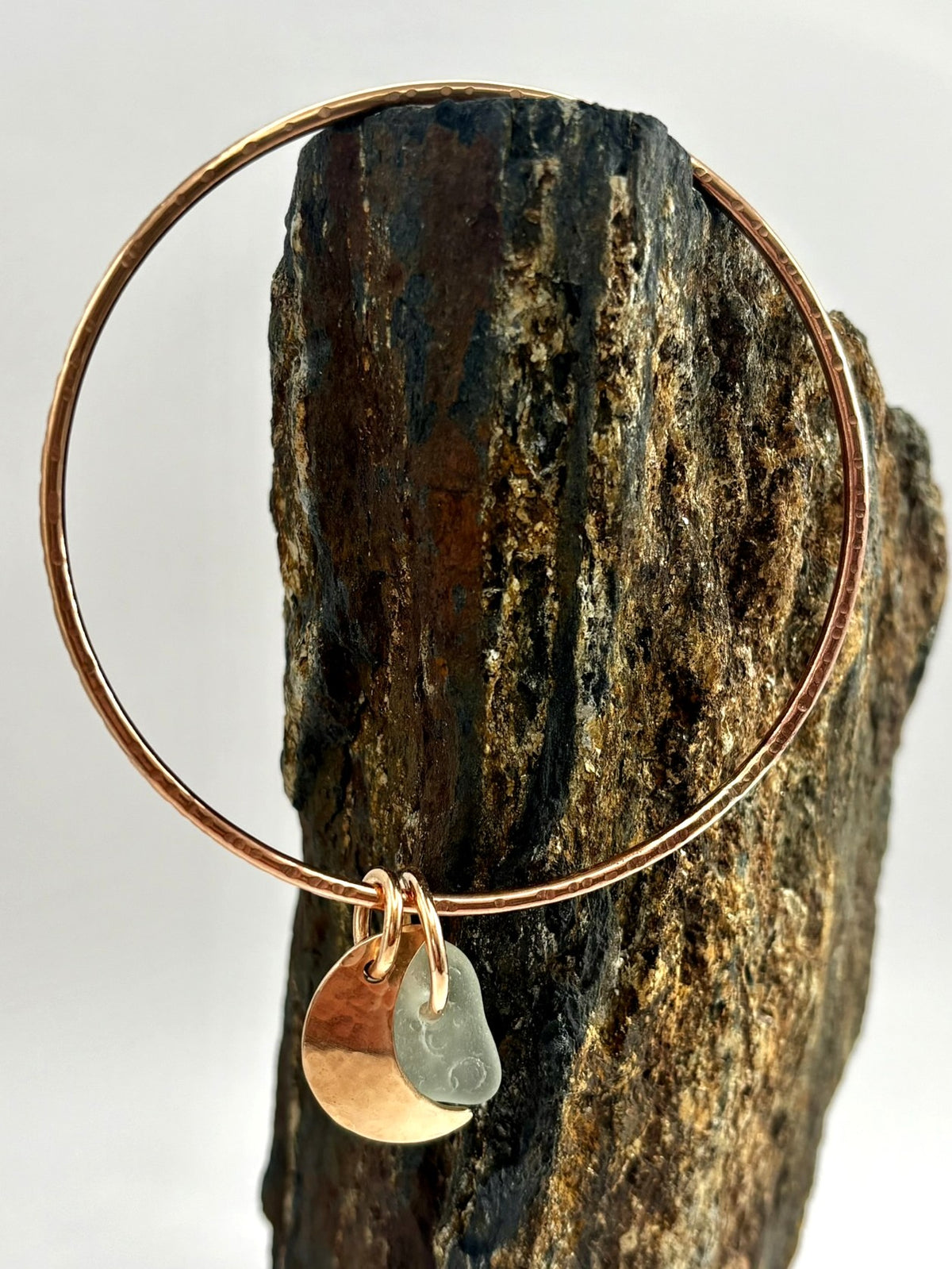 Hammered bronze sea glass charm bangle
