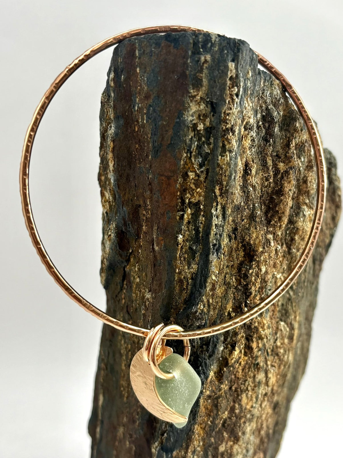 Hammered bronze sea glass charm bangle