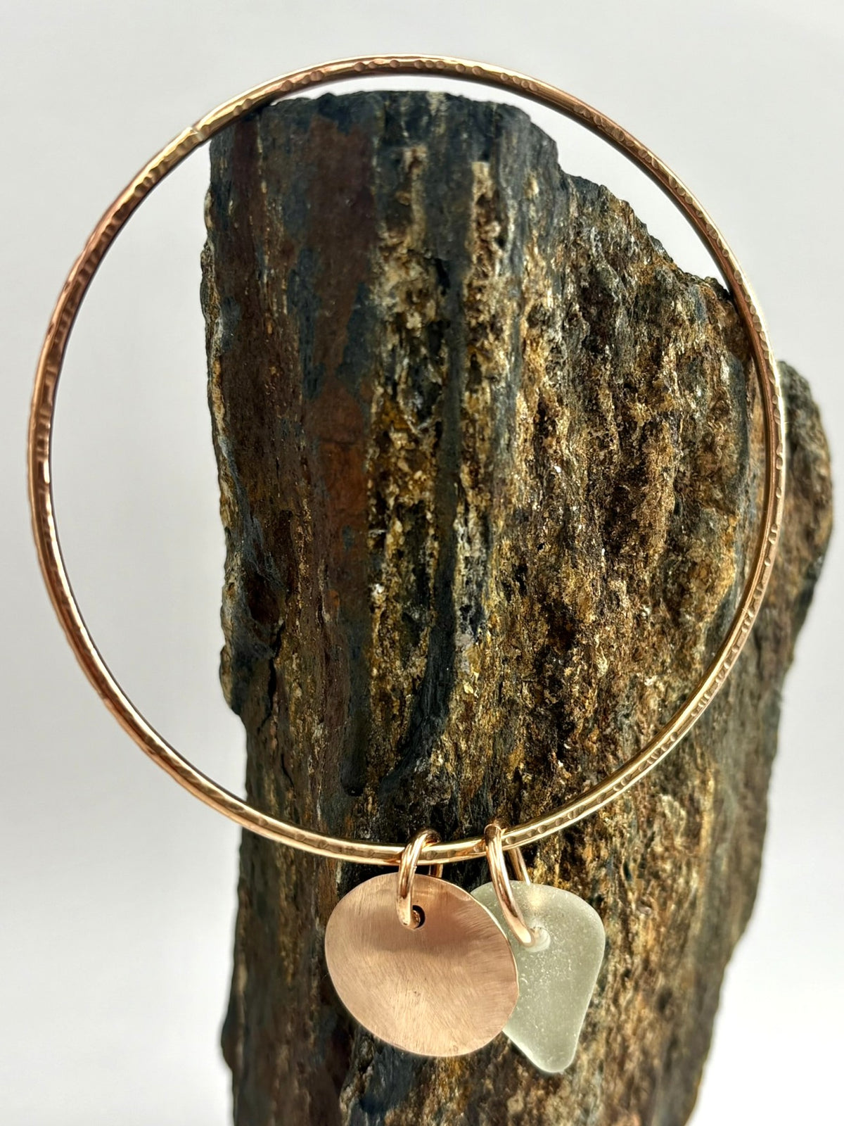 Hammered bronze sea glass charm bangle