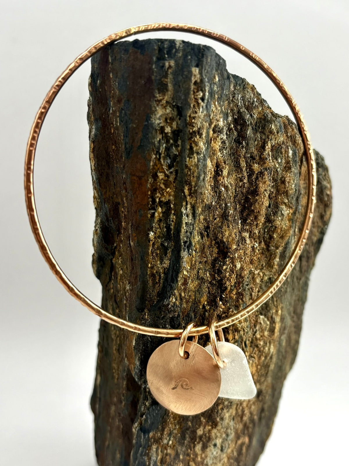 Hammered bronze sea glass charm bangle