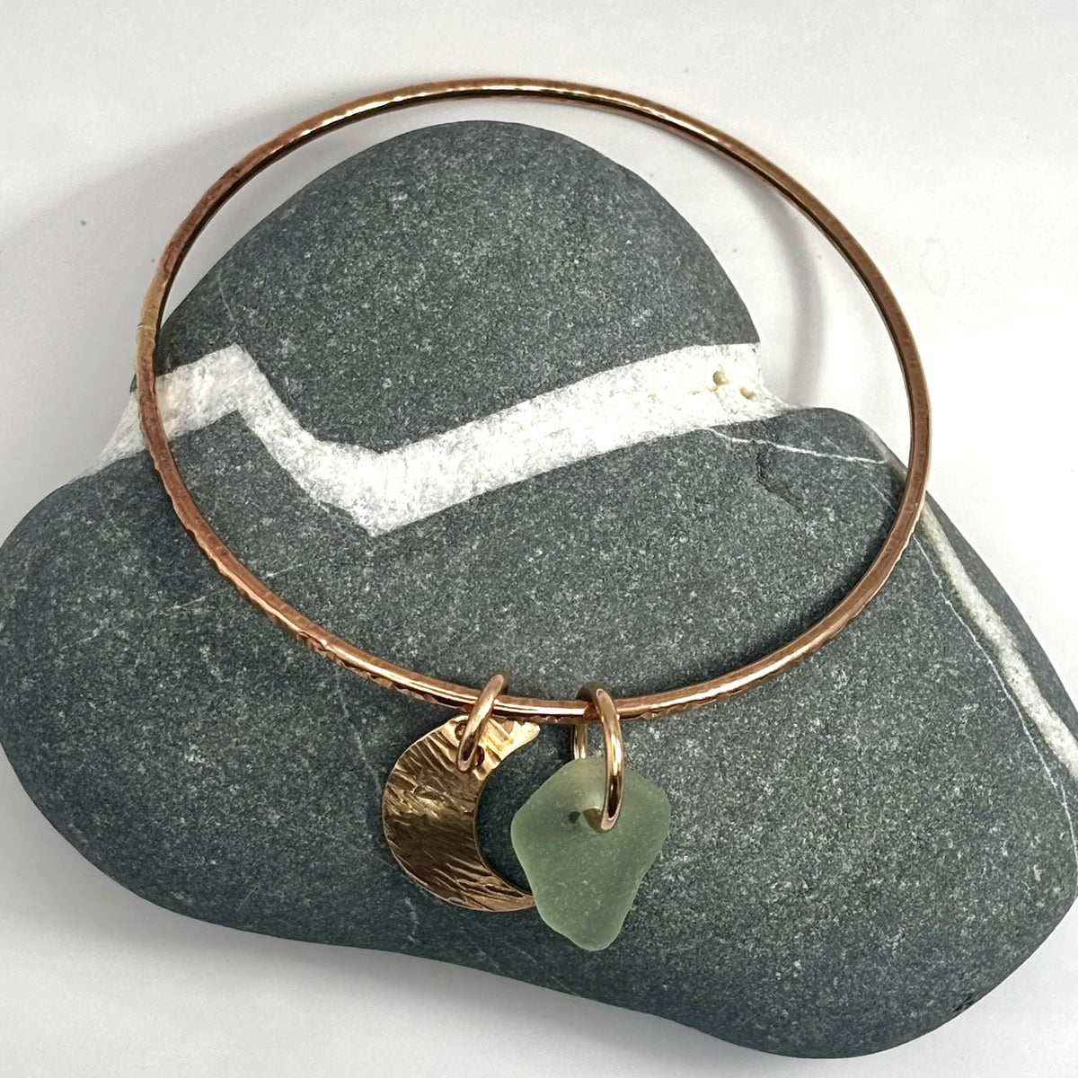 Hammered bronze sea glass charm bangle