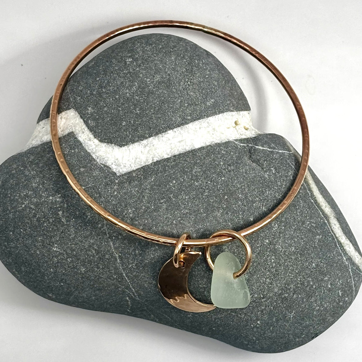 Hammered bronze sea glass charm bangle