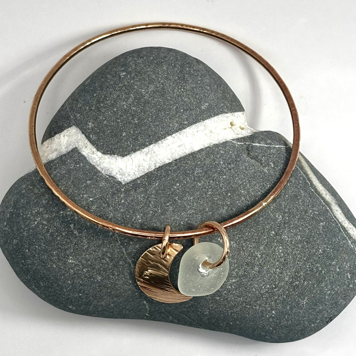 Hammered bronze sea glass charm bangle